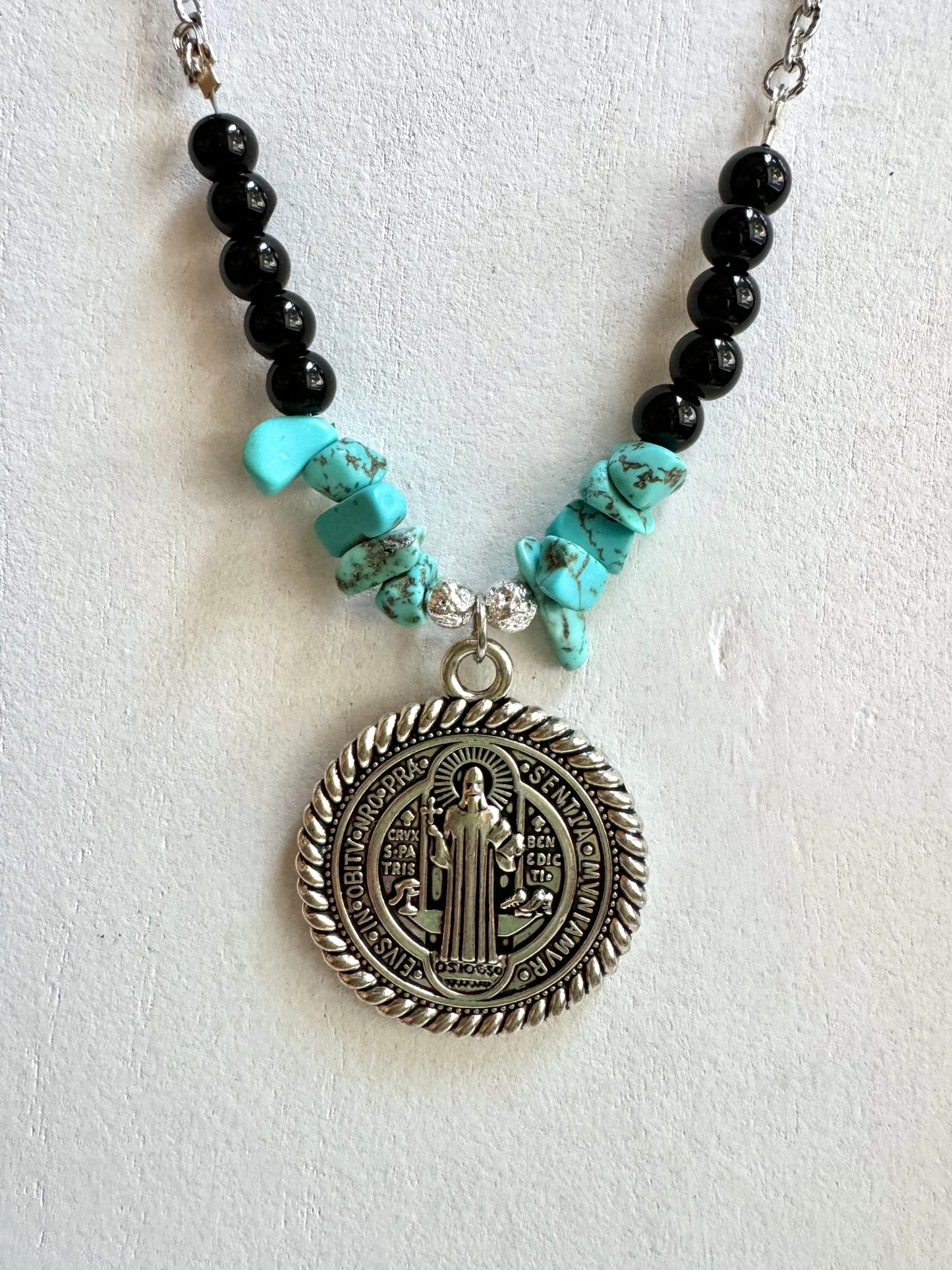 St. Benedict pendant close up