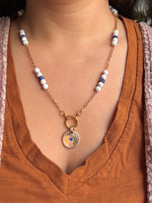 Blue stone pendant necklace on model