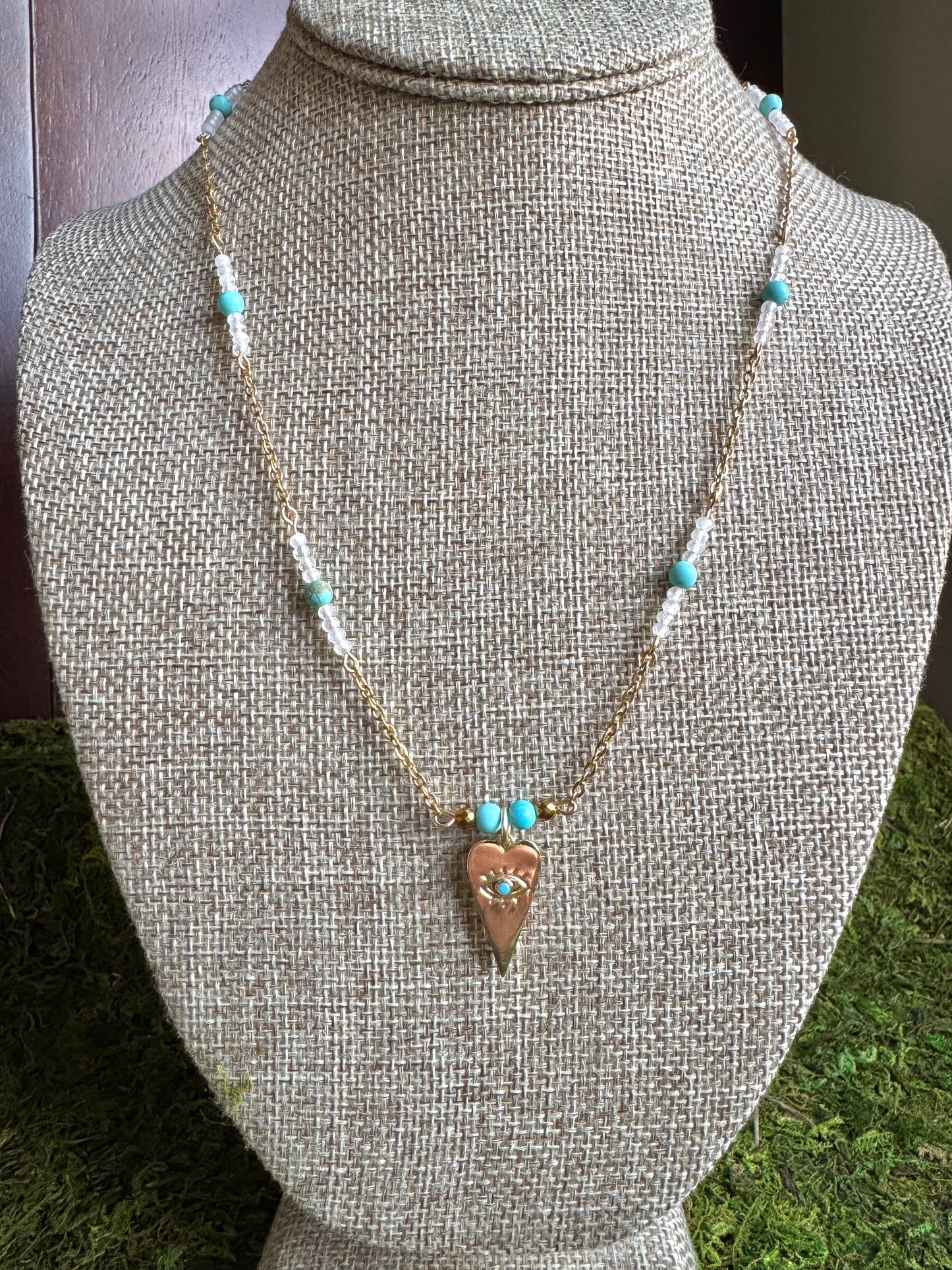 Necklace with a pendant on a mannequin bust