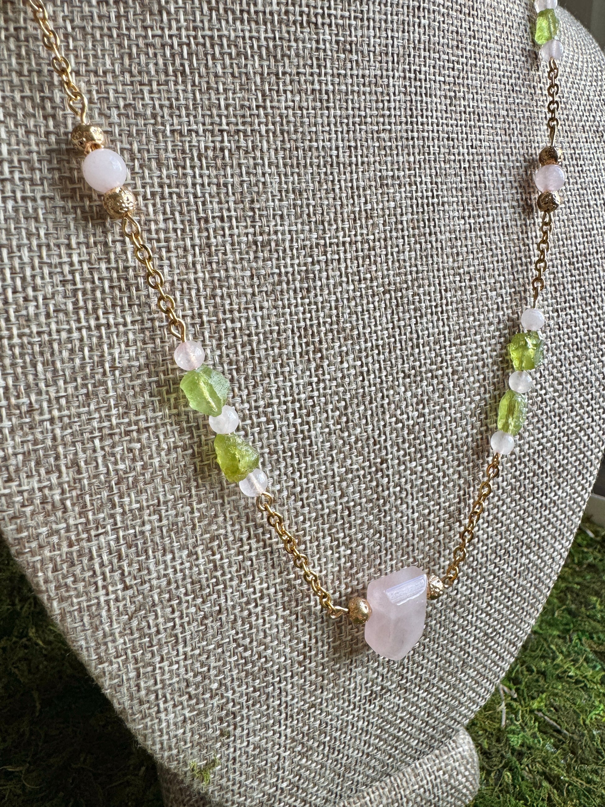 Necklace with beads on a textured surface